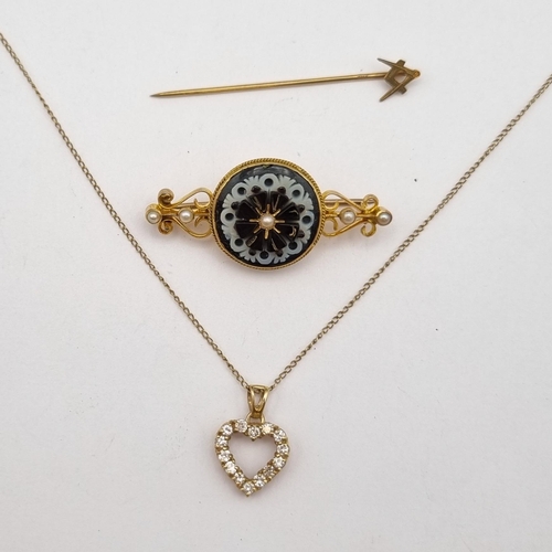 200 - A Mourning Brooch set black onyx and chalcedony forn=ming rosette between seed pearls, a 9ct gold he... 