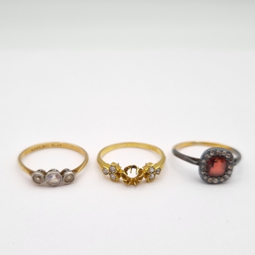 207 - An 18ct gold Ring set trios of old-cut diamonds, centre stone missing approx 2.40gms and a three sto... 