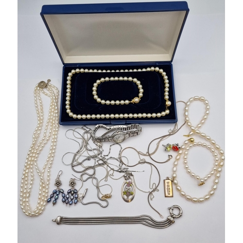 217 - A collection of Costume Jewellery, lady's Accurist Wristwatch, four strand silver Bracelet, silver I... 