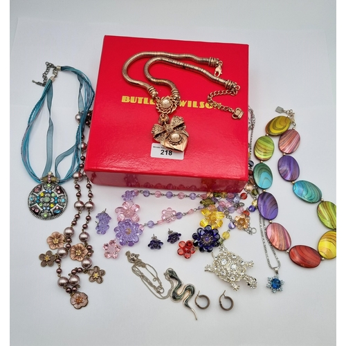 218 - A collection of Costume Jewellery including; Butler & Wilson Necklace, Pendant set blue and white pa... 