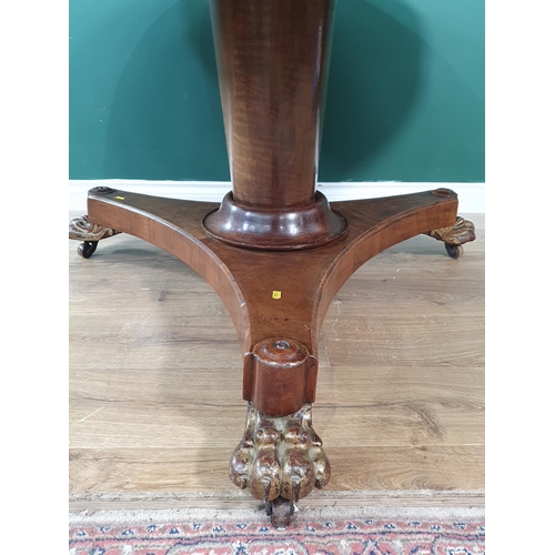 23 - A reproduction sectional mahogany veneered Centre Table raised on tripod concave base with three paw... 