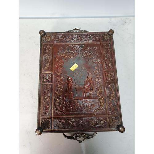 243 - An embossed brass two handled Tray 