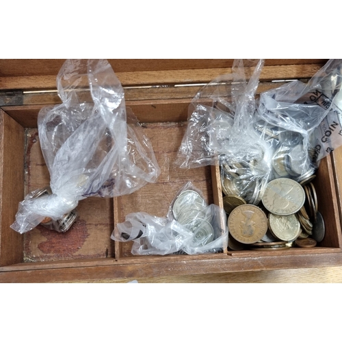 253 - A box of World Coins and Banknotes to include French Equitorial Africa 5 Franc, 10 Franc, and 20 Fra... 