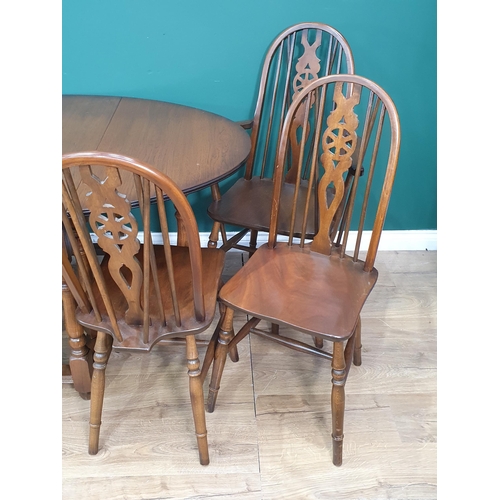 27 - An old Charm oak Gateleg Table 3ft 1in W x 2ft 5in H and a set of six wheelback Kitchen Chairs (R7)