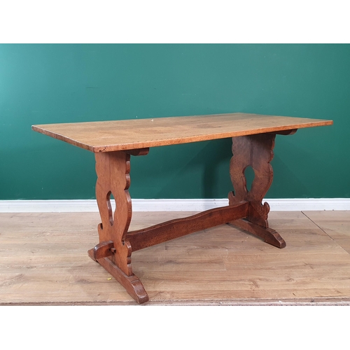 29 - An oak Refectory Table on shaped end supports 5ft L x 2ft 7in H (R7)