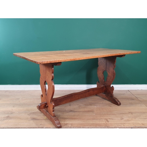 29 - An oak Refectory Table on shaped end supports 5ft L x 2ft 7in H (R7)