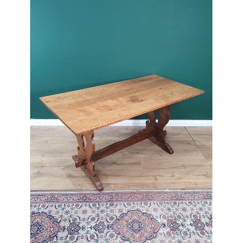 29 - An oak Refectory Table on shaped end supports 5ft L x 2ft 7in H (R7)