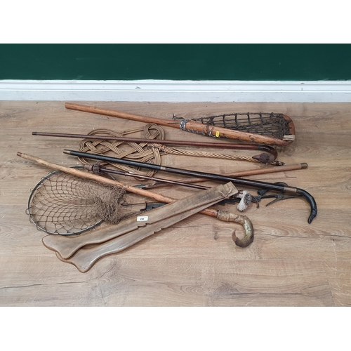 290 - Two Walking Sticks one with Fish handle the other with Greyhound handle, a vintage Landing Net, a Ca... 