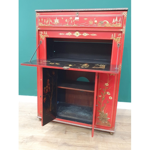 295 - A 20th Century red lacquered oriental Music Cabinet with lift up top, fall front compartment above p... 