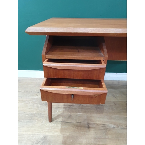 298 - A Danish Teak Desk by Gunnar Nielsen for Tibergaard, the rectangular top above three fitted drawers,... 