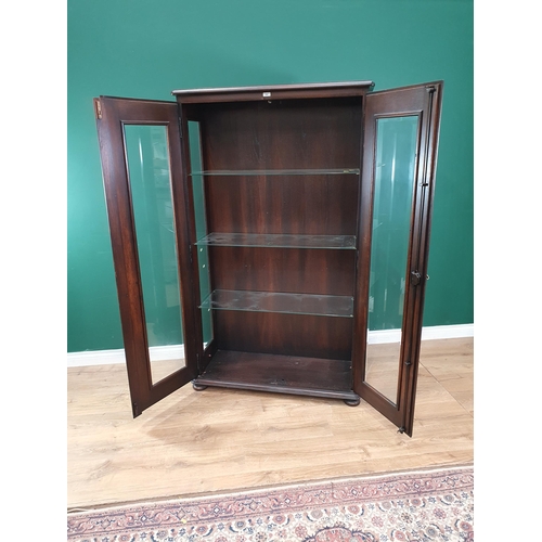 299 - A modern oak and glazed two door Cabinet with adjustable glass shelves 5ft 7in H x 3ft 3in W (R11)