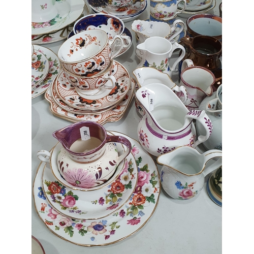 308 - A quantity of Teaware including floral trios, Gaudy Welsh Teaware, a Davenport Jug, lustre Jugs and ... 