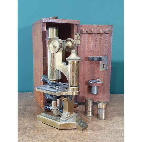 31 - A brass Student's Microscope by R & J Beck Ltd in fitted case (R6)