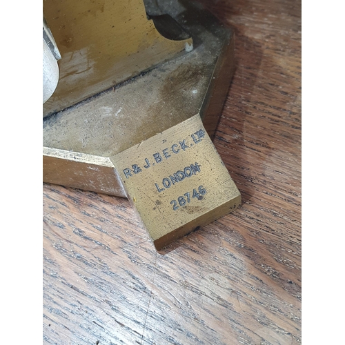 31 - A brass Student's Microscope by R & J Beck Ltd in fitted case (R6)