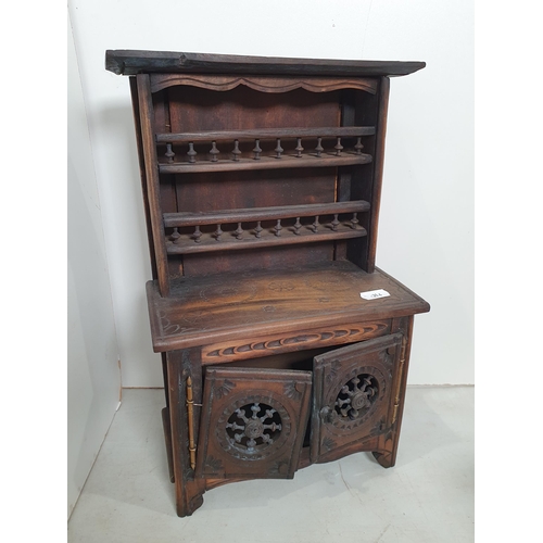 314 - A carved apprentice piece Dresser and Rack, 14in H, an oak Candle Box in the form of a Dough Bin, 10... 