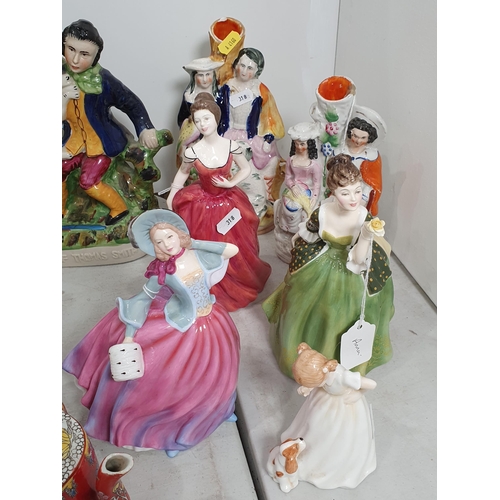 318 - A collection of Figures including Royal Doulton - 'Fleur', 'Innocence', 'Autumn Breeze', 'Sit', Roya... 