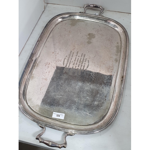 324 - A large two-handled silver plated Tray bearing inscription, 28in, a pair of plated on copper Candles... 