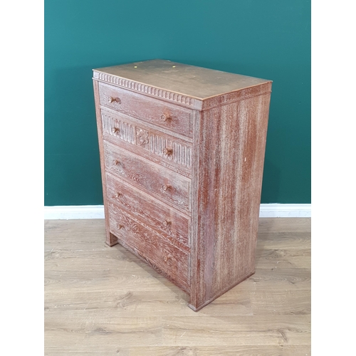 33 - A limed oak Chest of five long drawers with nulled and carved rose design 3ft 8in H x 3ft 8in W (R6)