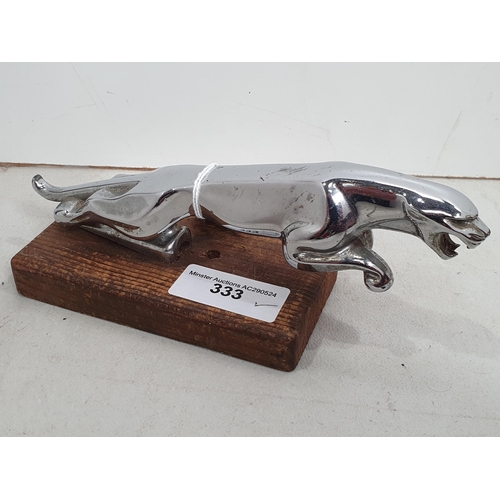 333 - A chrome-plated Jaguar Car Mascot on wooden plinth, 7 1/2in (R5)