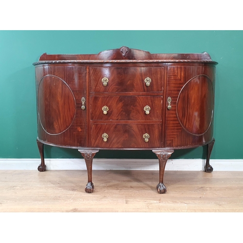 34 - A mahogany bow fronted Sideboard fitted pair of cupboard flanking three drawers raised on cabriole s... 