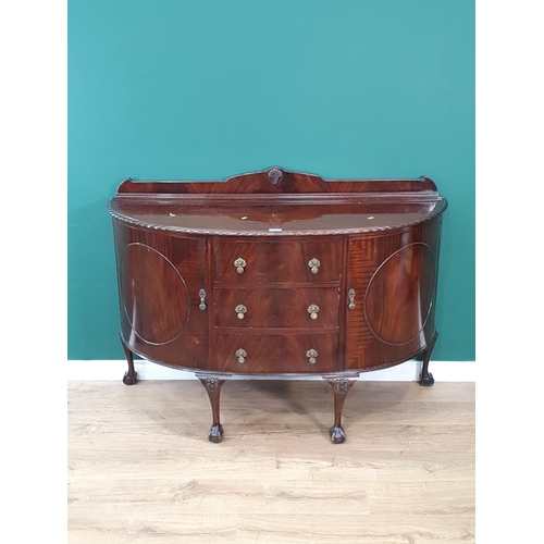 34 - A mahogany bow fronted Sideboard fitted pair of cupboard flanking three drawers raised on cabriole s... 