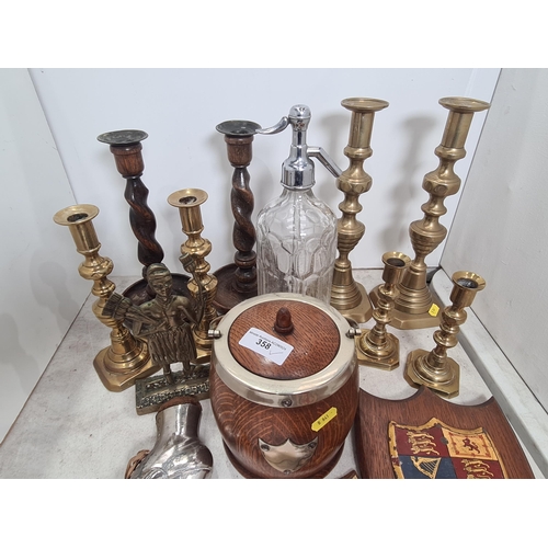 358 - A quantity of brass and treen Candlesticks, an oak Biscuit Barrel, Pin Cushion, Football Trophy Shie... 