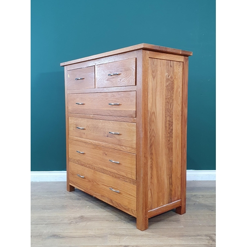 38 - A modern oak Chest of two short and four long drawers 3ft 6in H x 3ft 3in W (R4)