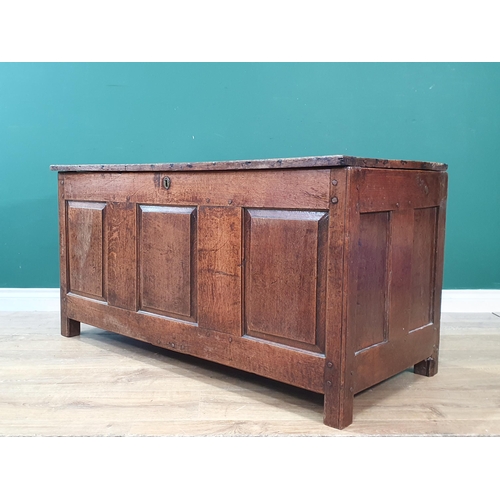 40 - An antique oak Blanket Chest with fielded four panel lid above three panel front 3ft 10in W x 2ft H ... 