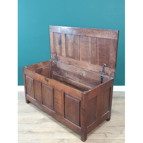 40 - An antique oak Blanket Chest with fielded four panel lid above three panel front 3ft 10in W x 2ft H ... 