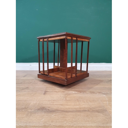 42 - An Edwardian mahogany and crossbanded table top Revolving Bookcase with shell inlay 1ft 3in H x 1ft ... 