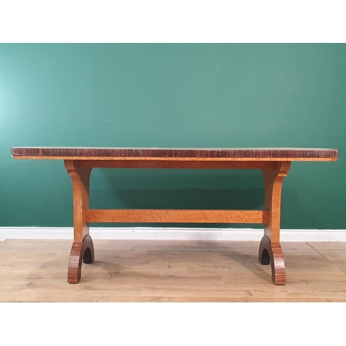 47 - An Art Deco birds-eye maple veneered and rosewood crossbanded Dining Table on arched end supports 6f... 