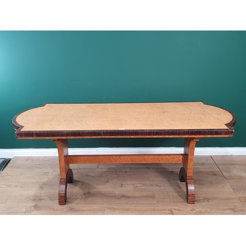 47 - An Art Deco birds-eye maple veneered and rosewood crossbanded Dining Table on arched end supports 6f... 