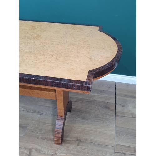 47 - An Art Deco birds-eye maple veneered and rosewood crossbanded Dining Table on arched end supports 6f... 