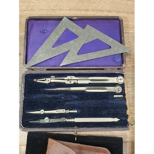 59 - Two turned treen Batons, two cased Drawing Sets, a pair of Opera Glasses in leather case, Weighing S... 