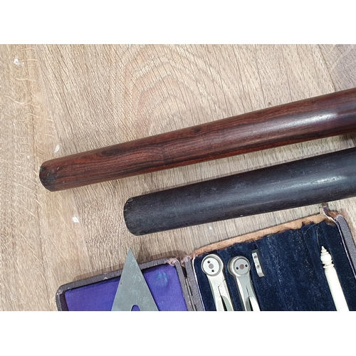 59 - Two turned treen Batons, two cased Drawing Sets, a pair of Opera Glasses in leather case, Weighing S... 