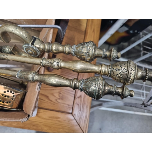 603 - A set of brass Fire Irons and pair of Andirons with engraved decoration, a brass Chestnut Roaster wi... 