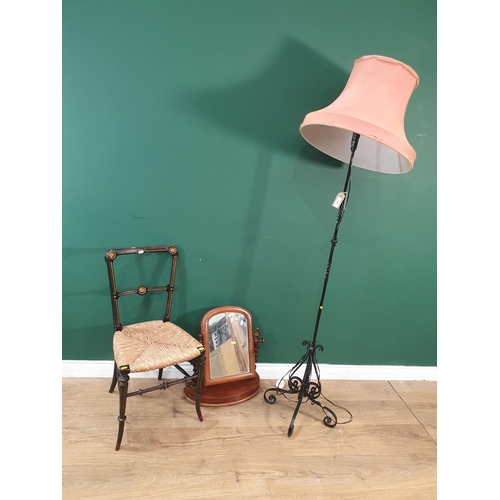 604 - A black painted metal Standard Lamp and shade, a Victorian ebonised rush seated Bedroom Chair and a ... 