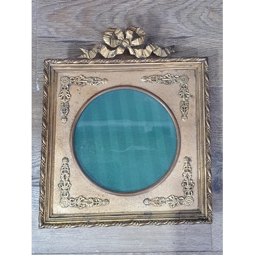 61 - An enamel decorated easel Photograph Frame with multi coloured floral decorations, a gilt metal Phot... 