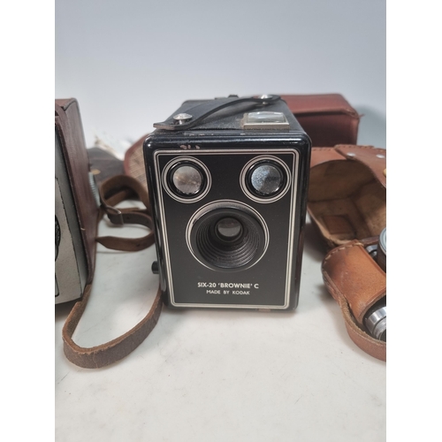 705 - A Coronet Vogue bakelite Camera, a Box Camera in case, a Lumiere Camera, a Brownie Movie Camera, a P... 