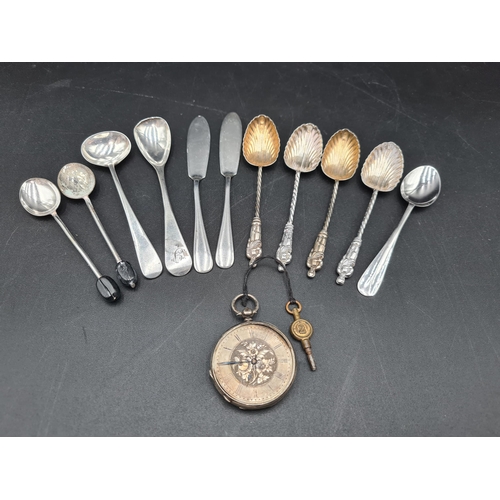 76 - Two George V silver Butter Knives, Birmingham 1934, four apostle Teaspoons, two Condiment Spoons and... 