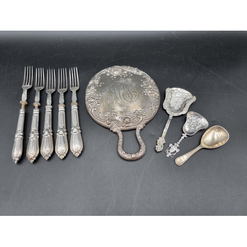 80 - A sterling silver Mirror, floral embossed, A/F, two Dutch Caddy Spoons, plated Caddy Spoon and four ... 