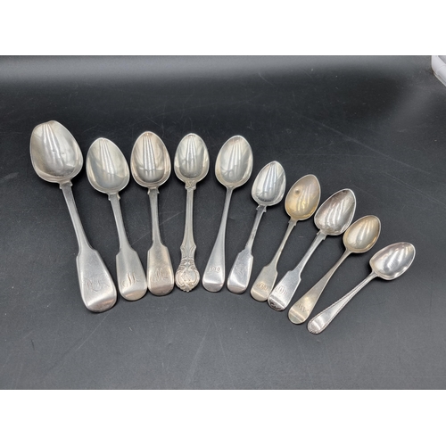 82 - A George IV silver Table Spoon fiddle pattern engraved initials, London 1824, four various Dessert S... 