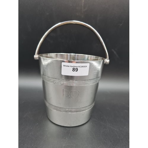 89 - A Mappin & Webb plated Ice Bucket with swing handle and P & O logo, and a Cocktail Shaker (R3)