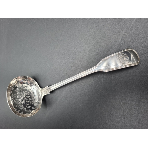 92 - A Victorian silver Sifting Ladle fiddle and thread pattern engraved initials, London 1851