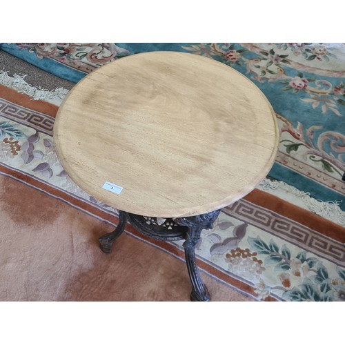 3 - A Victorian circular Pub Table with scrub top on cast iron base 2ft 4in H x 2ft D