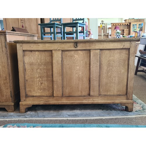 15 - A Georgian oak Coffer with fielded three panel front raised on bracket feet 4ft 1in W x 2ft 7in H x ... 