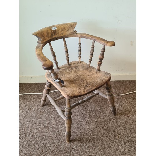 22 - A Victorian ash and elm Smoker's Bow Armchair with turned spindle back 2ft 7in H x 1ft 3in W