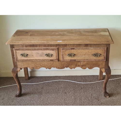 85 - A 19th Century oak and mahogany crossbanded Dresser Base fitted two frieze drawers above shaped frie... 