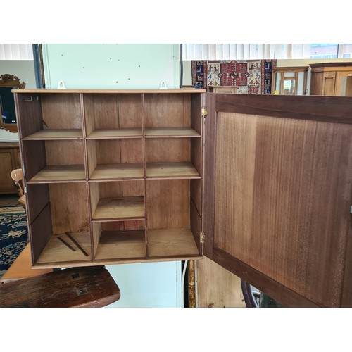 139 - A stripped mahogany Wall Cupboard fitted single door enclosing pigeon hole interior 1ft 8in W x 1ft ... 