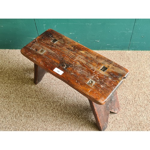 140 - A Victorian stained pine Milking Stool on splayed supports 1ft 8in W x 1ft 1in H